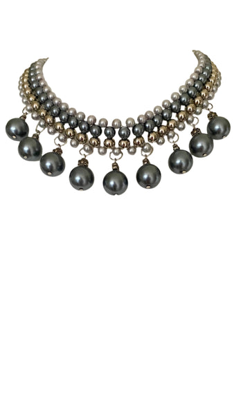 Crafted with elegant faux pearls in a stunning range of silver grey and blue tones, this necklace exudes sophistication and charm. Measuring at 38cm with a 10cm extension chain, lobster claw clasp it can be easily adjusted for the perfect fit. Elevate any outfit with this timeless piece.