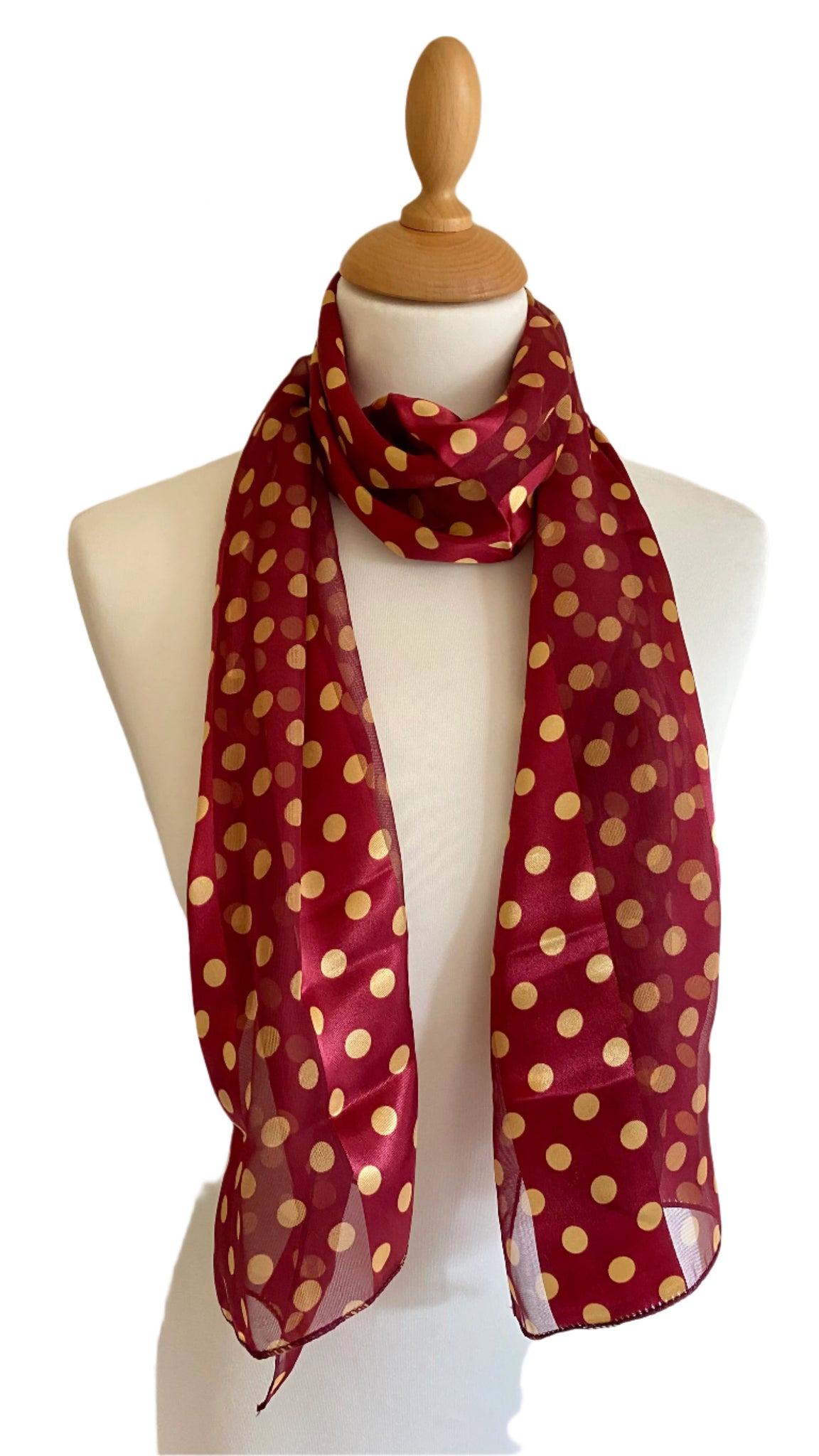 Revamp your wardrobe with these classic, colorful polka dot scarves. Made from 100% Polyester, they offer a smooth and luxurious feel. Measuring 150cm x 34cm, they make a perfect statement.