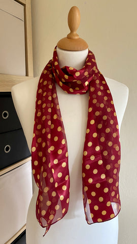 Revamp your wardrobe with these classic, colorful polka dot scarves. Made from 100% Polyester, they offer a smooth and luxurious feel. Measuring 150cm x 34cm, they make a perfect statement.