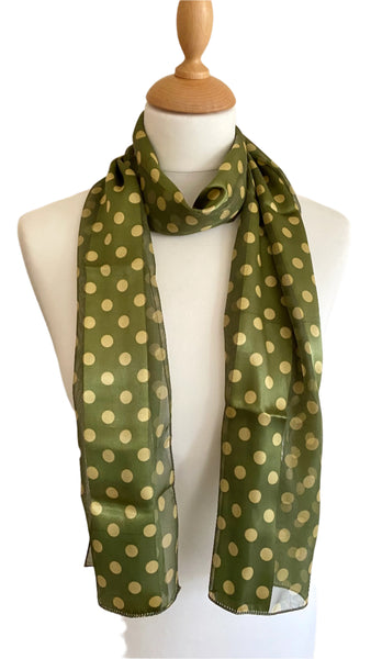 Revamp your wardrobe with these classic, colorful polka dot scarves. Made from 100% Polyester, they offer a smooth and luxurious feel. Measuring 150cm x 34cm, they make a perfect statement.