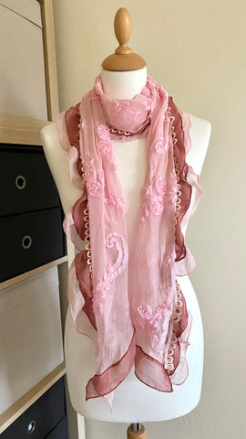 This blush pink vintage-styled scarf is an elegant piece for your wardrobe. The polyester fabric is super lightweight and it measures approximately 150cm x 30cm, allowing you to drape it around your neck in a graceful, contrasting way. Add a touch of classic style to your daily ensemble.