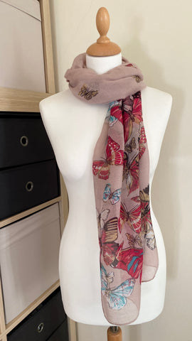 This dusky pink butterfly scarf is a fashionable and comfortable accessory for any occasion, made from 100% polyester, it is lightweight and soft against the skin, while its generous 180cm x 80cm size ensures it can be worn in many different ways. Create a unique look with the eye-catching random butterfly design. unique random butterfly design will make you stand out from the crowd.