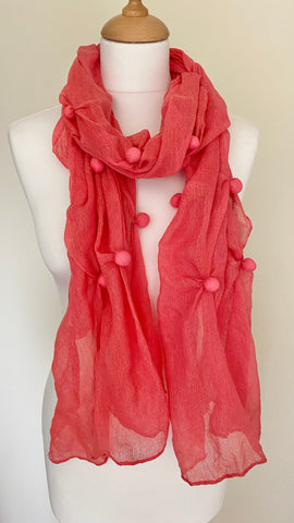 smart casual coral colour scarf with bobble design feature lightweight
