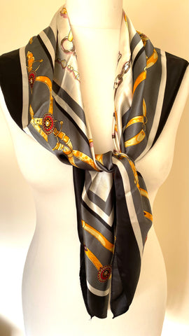 Super silky feel square shaped scarf drapes well classic design main colour black grey and gold